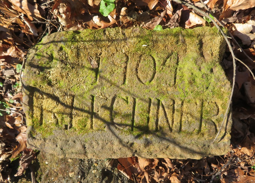 A brick/stone inscribed with 