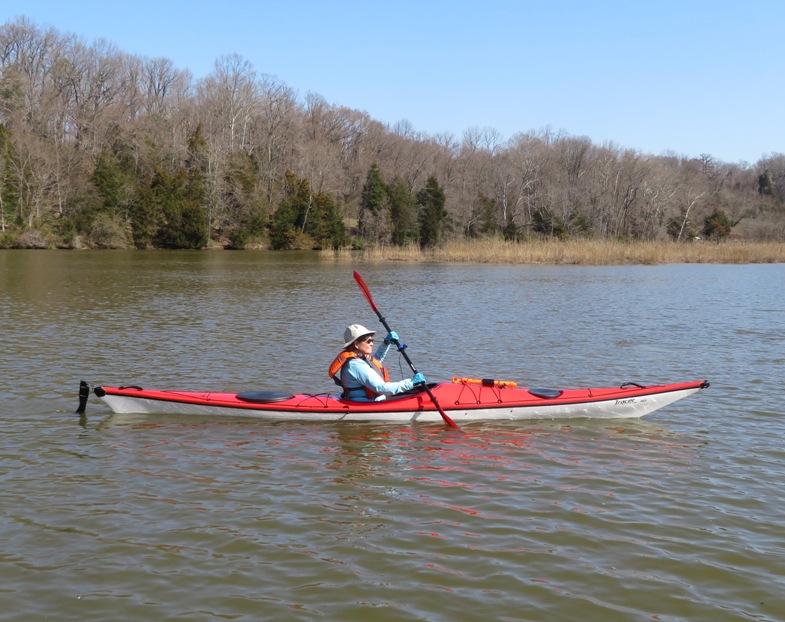 Kathleen in a red kayak