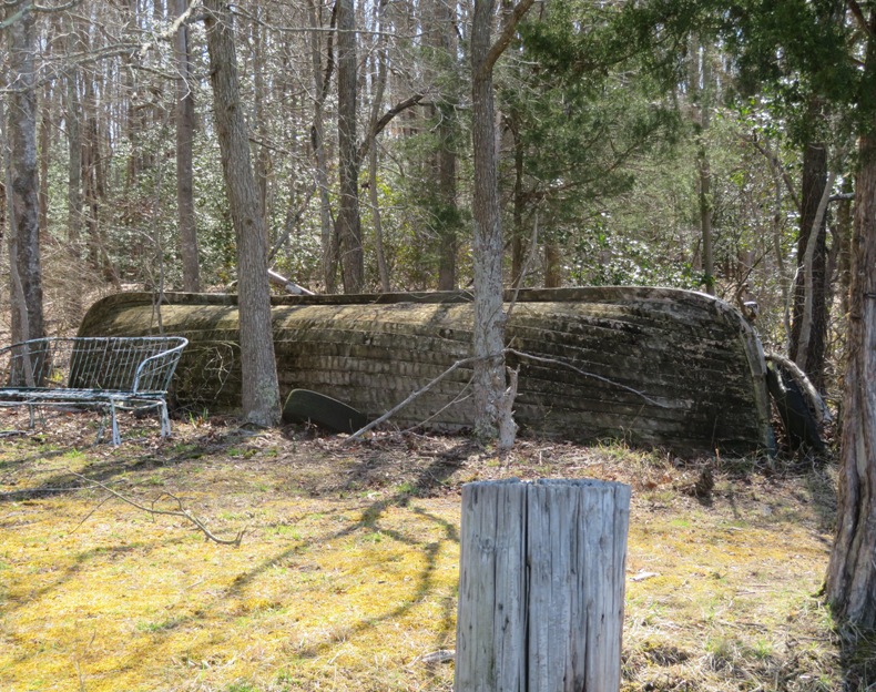 An old, heavy, wooden boat