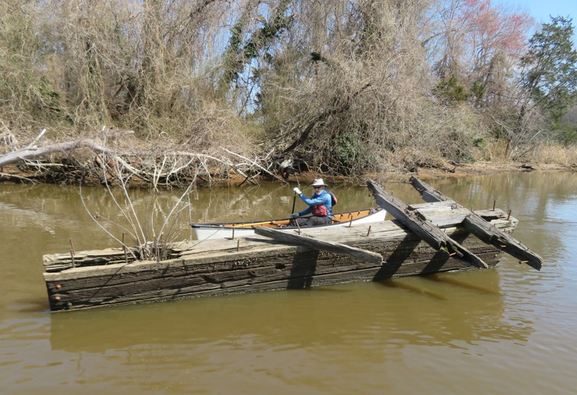 Chip canoeing by the ruins of something unknown