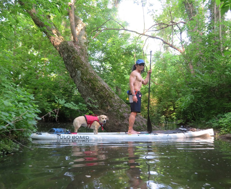 Daphne and I on SUP with big tree behind