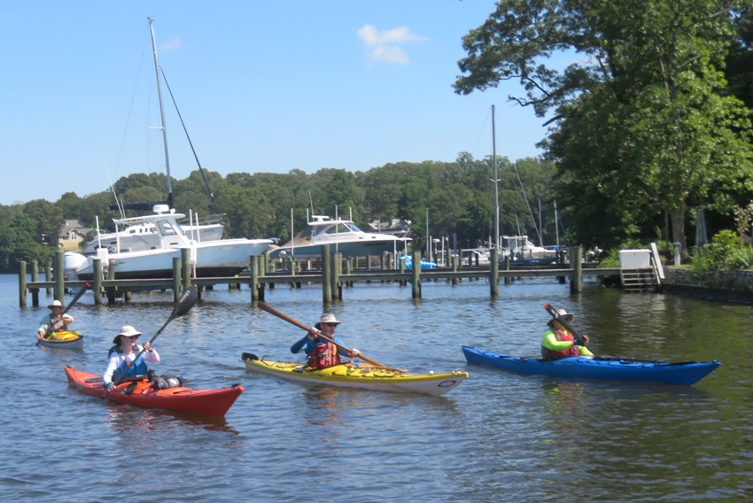 Four kayakers with Chip second from right