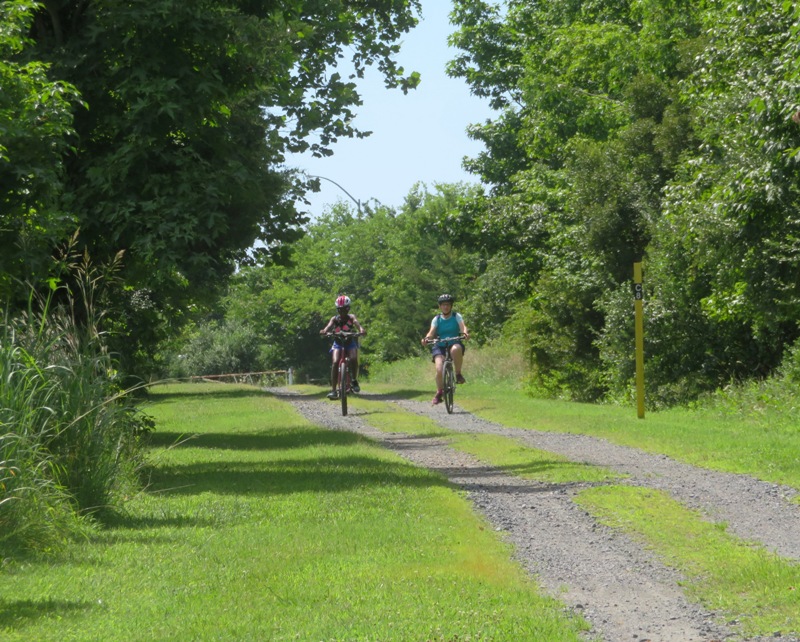 Norma and her niece bicycling at Terrapin Nature Park