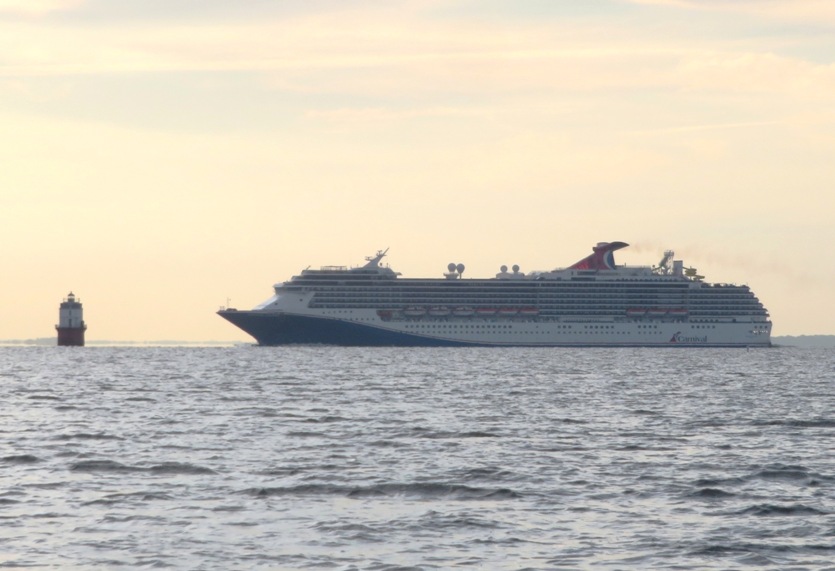 Cruise ship looking like it was doing to hit the lighthouse