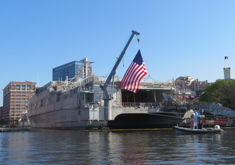 Aft side of USNS Newport with big U.S. flag