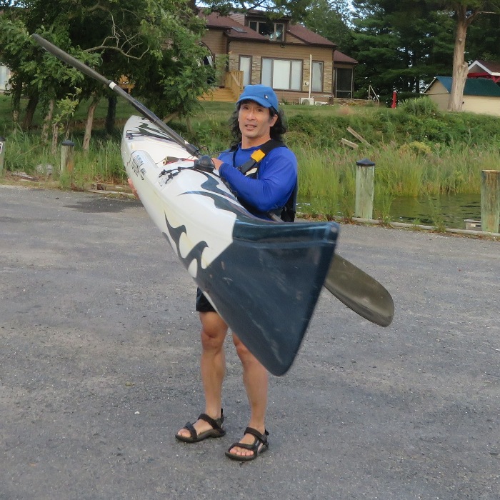 Me holding my surf ski