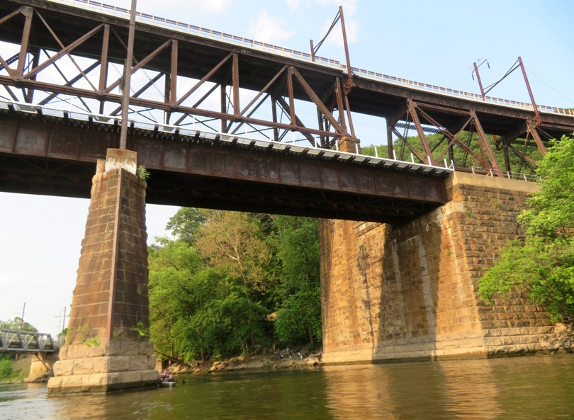 Safe Harbor Bridge with someone fishing from a kayak