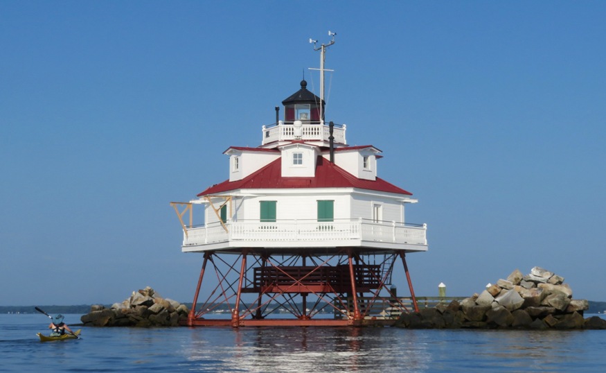 Sara kayaking to the lighthouse