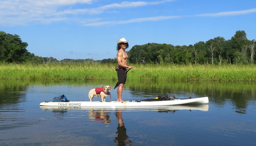 Side view of Daphne and me on SUP