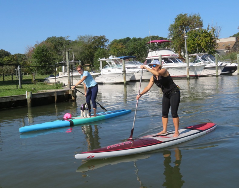 Maggie, Christine, and Lane on SUPs