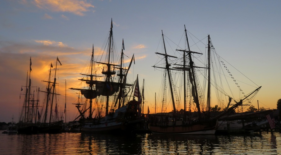 Silhouette of ships at sunset