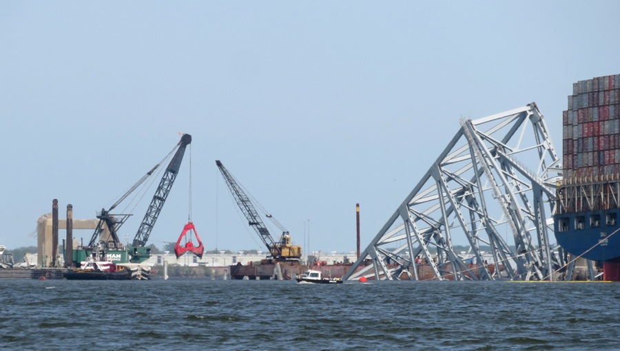 Bridge ruins on northeast side with small boat in front