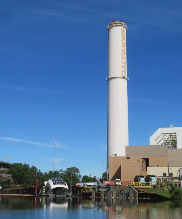 Gwynnda next to Wheelabrator Incinerator and its big smokestack