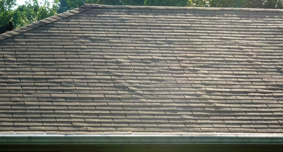 Roof shingles not lying flat on August 11, 2013 at 1742